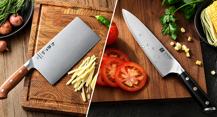 Chinese cleaver and chef knife compared side by side on a kitchen cutting board